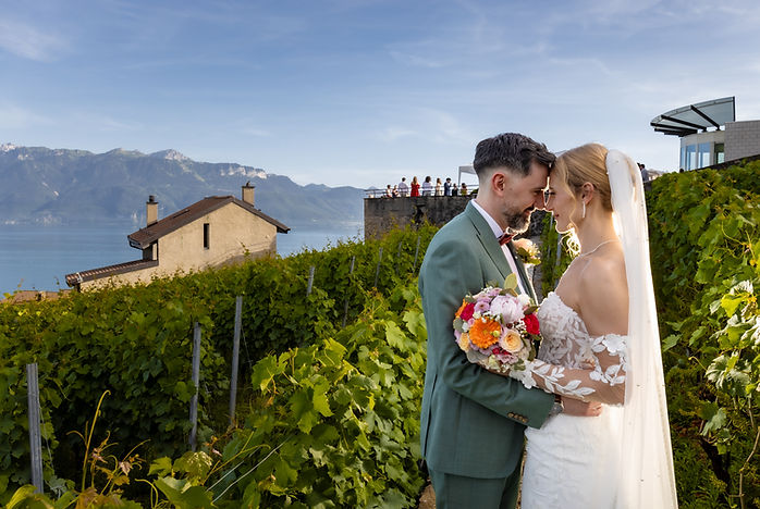 Vahide and Adrien forehead to forehead in the Lavaux vineyards, above Lake Geneva