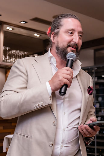 Derek at the microphone during the evening