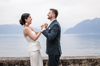 The couple dancing by the water