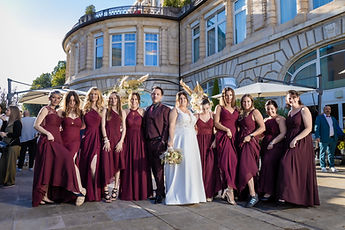 Sabrina, Idrisse and the bride's friends in burgundy dresses