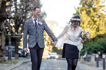 Laughing while walking, bouquet in hand