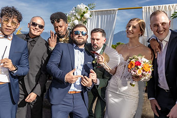 Friends crowd around the couple