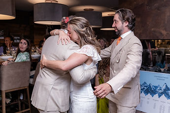 The couple embracing during the evening