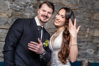 Albina and Diamant showing their wedding rings and smiling, at Martigny town hall