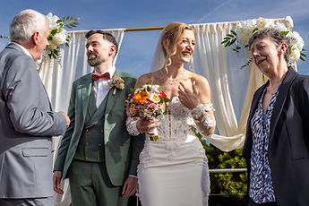 A moment of laughter between the couple and two loved ones