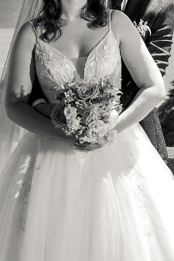 Detail of the bodice and bouquet, in black and white
