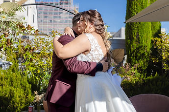 The couple embracing after the vows