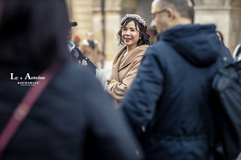 Ly smiling among the guests
