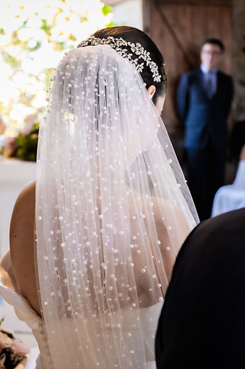 Gemma's veil in the foreground, Jean in the background