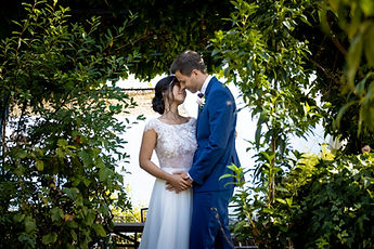 Liliane and Antoine under the pergola, among the greenery