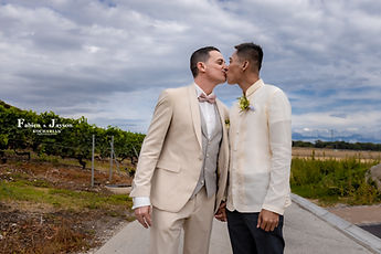 A kiss on the cheek among the vines