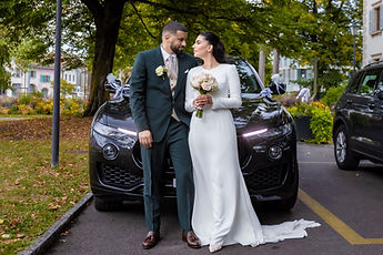 Leila and Marouan in front of the car, full length