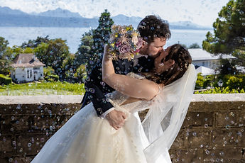 Patrick dips Lucie for a kiss beneath the soap bubbles