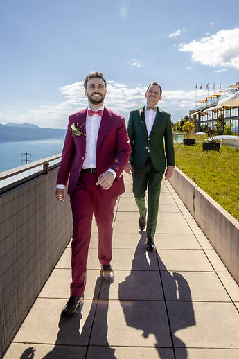 Loïc and Boris walk towards the camera, smiling