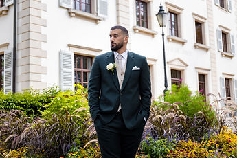 Marouan outside the town hall, hands in his pockets