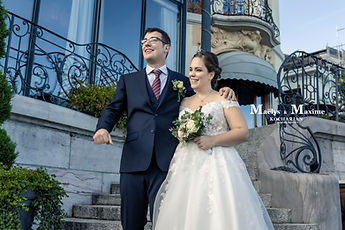 The newlyweds laughing in front of the Casino