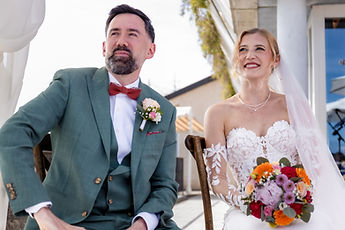 The couple looking up, smiling