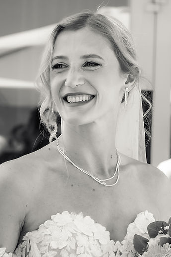 Portrait of Vahide smiling, in black and white
