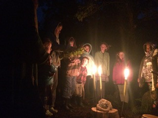 Children gathered to to make their offerings