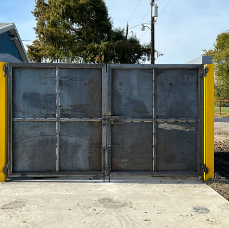 Dumpster door fabrication and install.  1_4_ steel plate