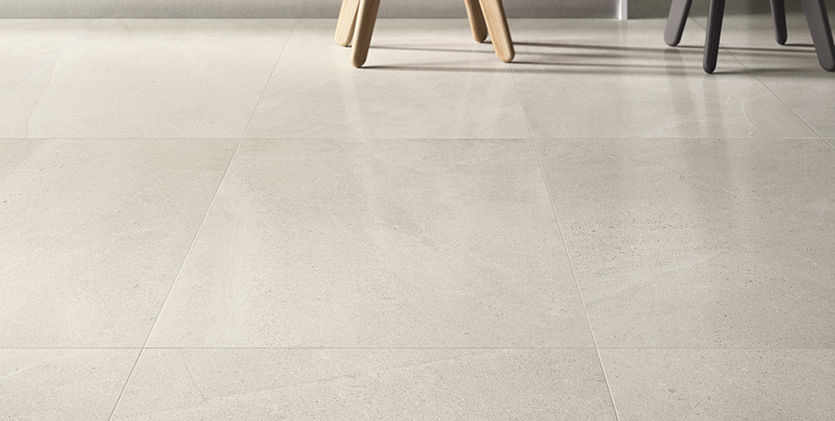 FLOW 2.0 Marfim tile close-up showing natural stone finish