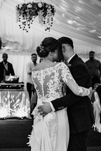 newly wed couple dancing at reception