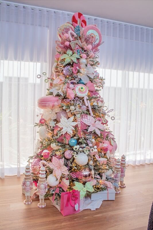 Candy themed Christmas tree styling with pink pastel ornaments in a modern Sydney home.