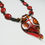 Thumbnail: Red and Orange Twisted Spoon