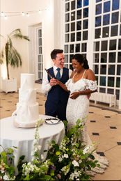 Couple enjoying their cake cutting