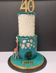 Golf and safari themed cake on a green board