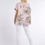 Thumbnail: Vintage wash floral linen mix dip hem top