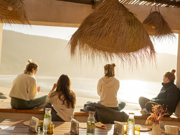 surf and yoga retreat morocco guests enjoying the view from our luxurious surf lodge.