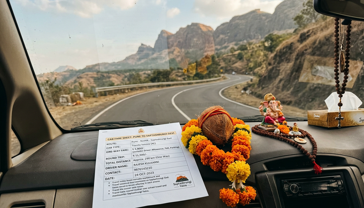 Close-up view of a cab fare chart placed beside temple flowers
