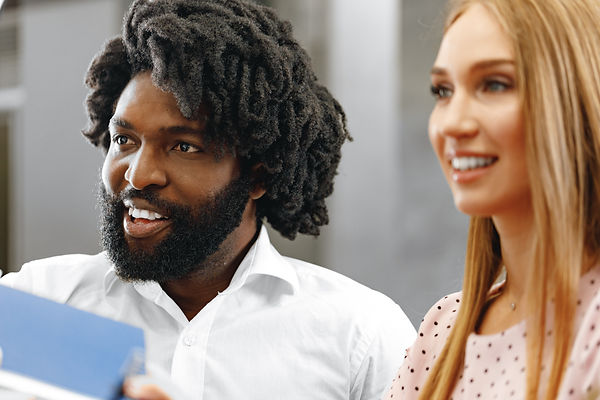 Caucasian Woman and African American Man Engaging in Discussion