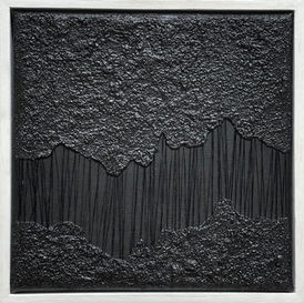 Abstract black textured art piece where black thread is holding two black textures canvases