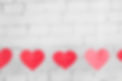 Heart banner on a brick wall