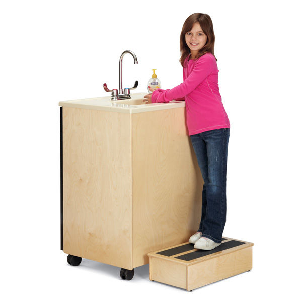 Thumbnail: Standard Stool in use by a child, demonstrating its stability and height assistance for reaching higher surfaces.