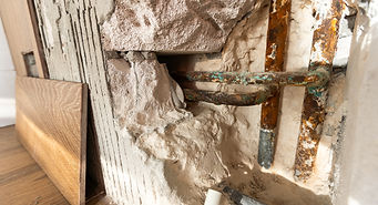 water-damaged-wall-in-an-old-house-water-damage-b-2024-02-26-21-21-50-utc.jpg