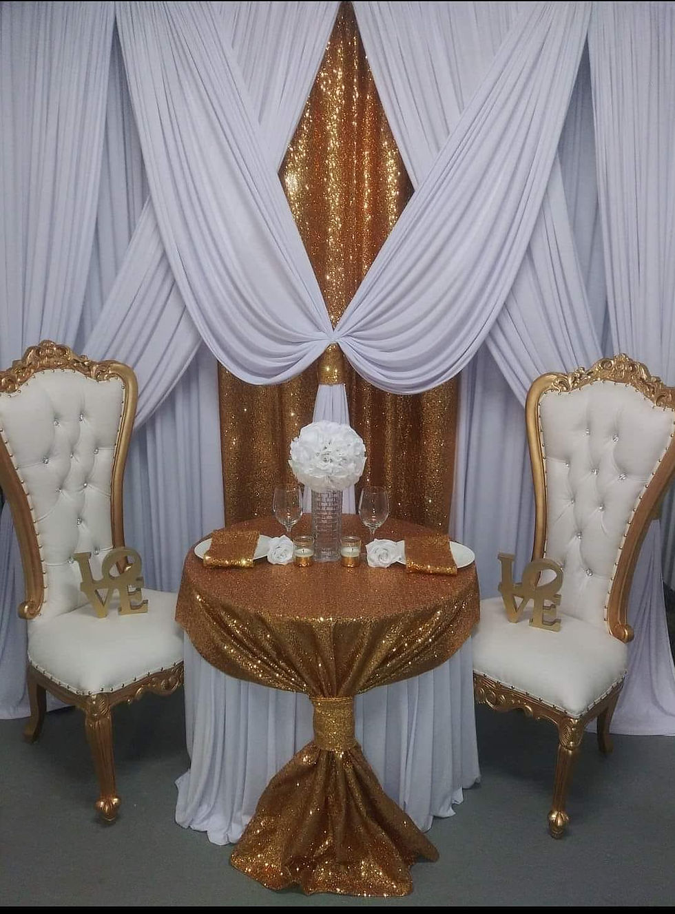 white and gold draping