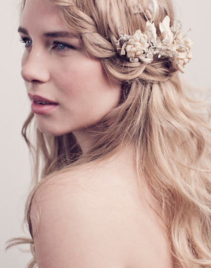 Dewy, flawless skin for summer beach or country wedding. Long lashes and full lips for bridal makeup. Dutch or French plait hairstyle.