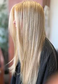 bright blonde highlighted long hair inside spinosi's hair studio in hoover alabama