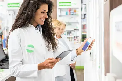 Female smiling pharmacist