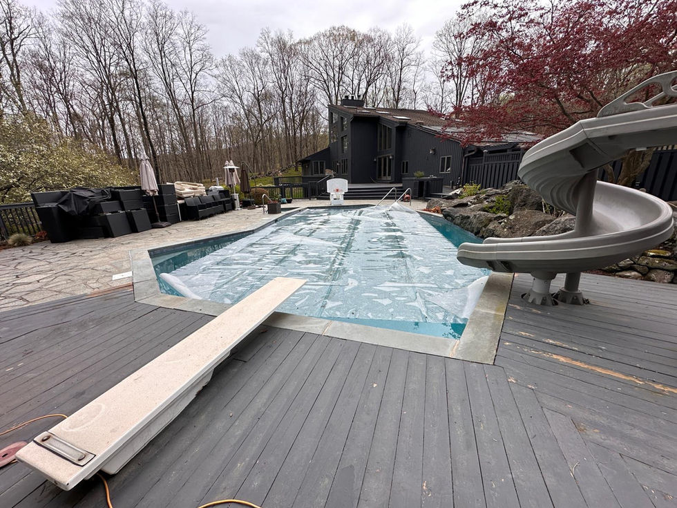 Peeling solid stain on wood pool deck before sanding and restoration in Westchester County, NY