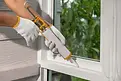 construction-worker-using-silicone-sealant-600nw-2480425877.webp