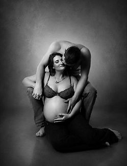 Elegant maternity portrait of an expecting mother in a studio in Ipswich