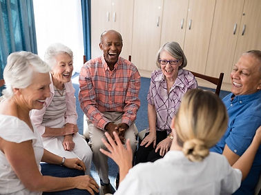 pegasus-creston-village-cheerful-seniors-sitting-in-a-circle.jpeg