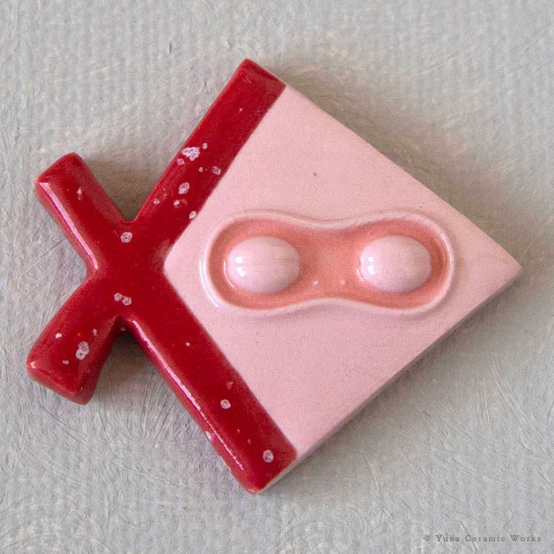 ピンクのお魚遮光器さん