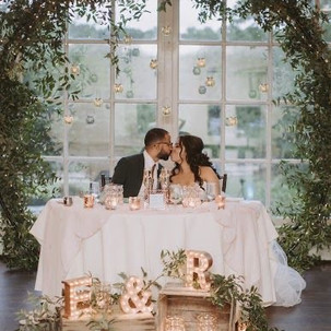 GREENERY COVERED WEDDING RING ARCH