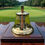 Thumbnail: Golf Warning Bell on a presentation table