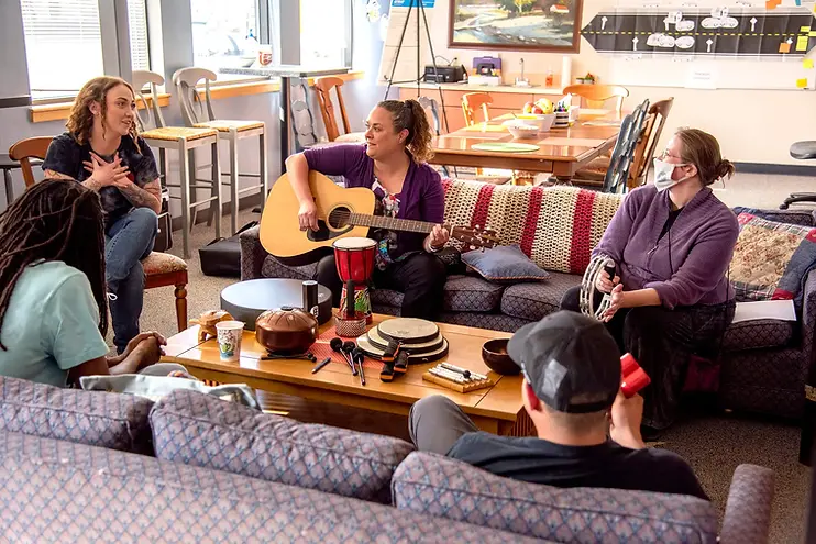 tri_group_couch_guitar (1).webp